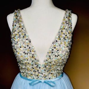 Mac Duggal ballgown 
Size 4 
Color: Ice blue 
New with tag